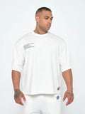 Curated Oversized Vintage Wash Tee in washed off white in organic-cotton blend, on the model