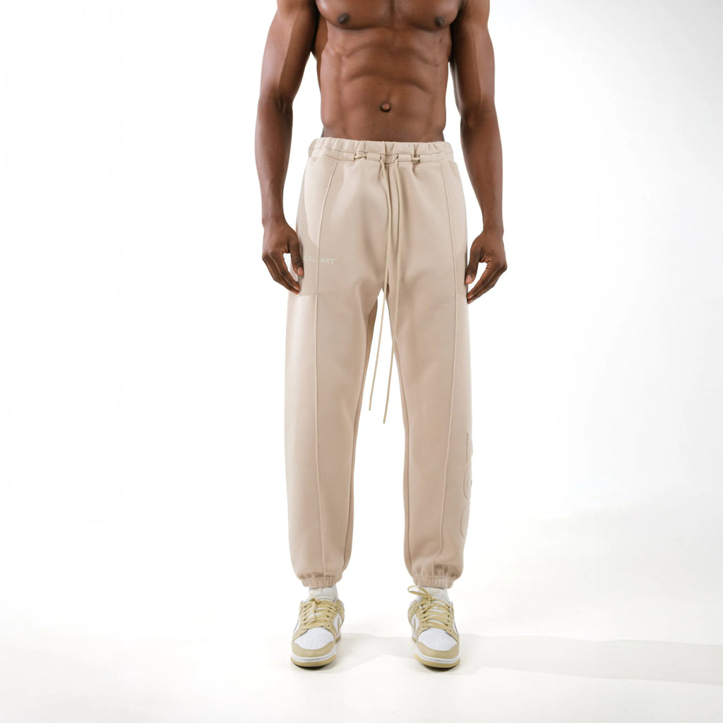 Front view of the beige Reversible Ego Oversized Jogger